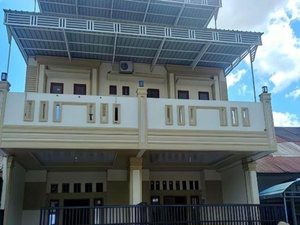 Oyo 2220 Pink'S Guest House Tarutung Buitenkant foto